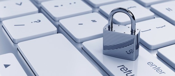 Complete data security and Data secured and persisted with MSC database. Picture of padlock on a white keyboard.